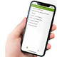 Master Seminarplatzvergabe Eine Hand hält ein Handy mit geöffneter TU App zur Buchung der Kurse.