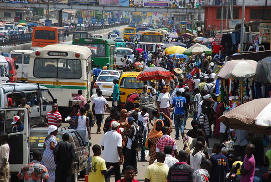 busy street busy street with lots of people and cars